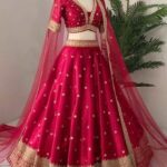 Embroidered Raw Silk Lehenga Choli with Net Dupatta